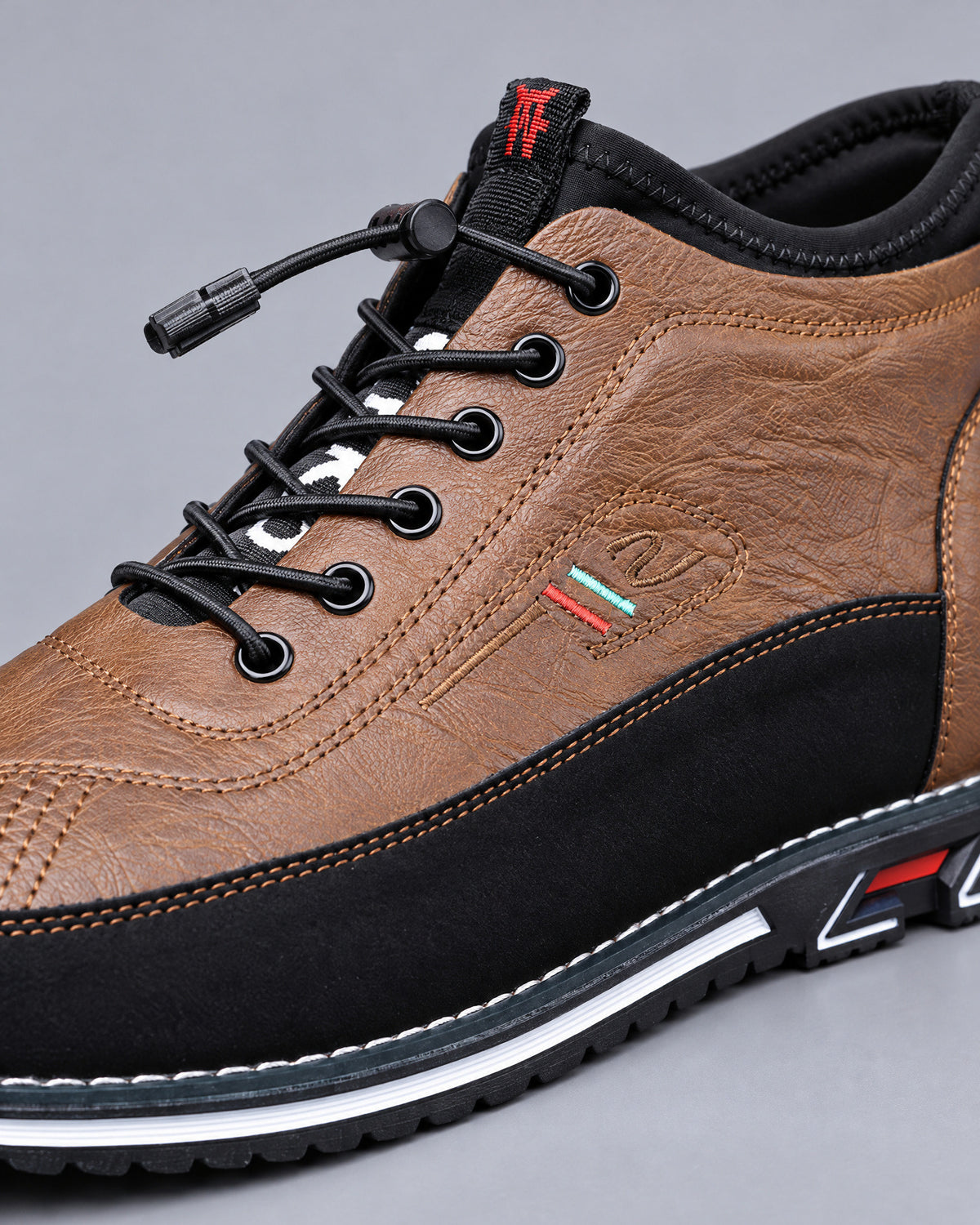 Two-Tone Leather Mid-Top Sneakers for Men – close-up detail