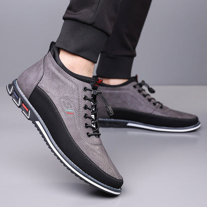 Gray Torven Leather Mid-Top Men's Sneakers with black laces, contrast sole, and Italian flag detail patch on side.
