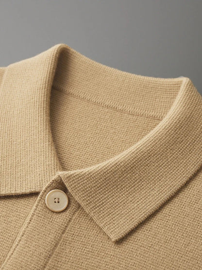 Camel beige merino wool knit cardigan jacket collar detail with single cream button placket close-up