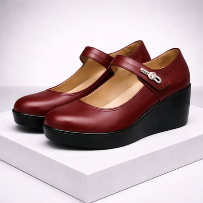 Women's burgundy leather Mary Jane platform shoes with orthopedic wedge sole and decorative buckle strap