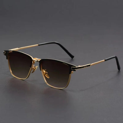 Men's metal frame polarized sunglasses with gold and black browline design, gradient brown lenses, and slim temple arms.