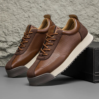 Brown leather lace-up orthopedic sneakers for men with textured panels, suede accents, and thick cushioned sole