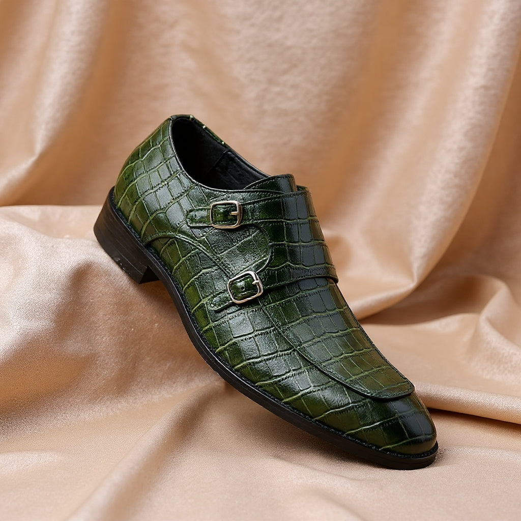 Green crocodile-embossed leather men's double monk strap dress shoes with silver buckles on beige satin fabric