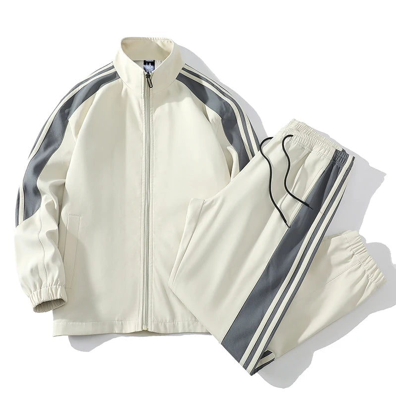 Men's white tracksuit set with grey stripe detail, full-zip jacket and matching jogger pants