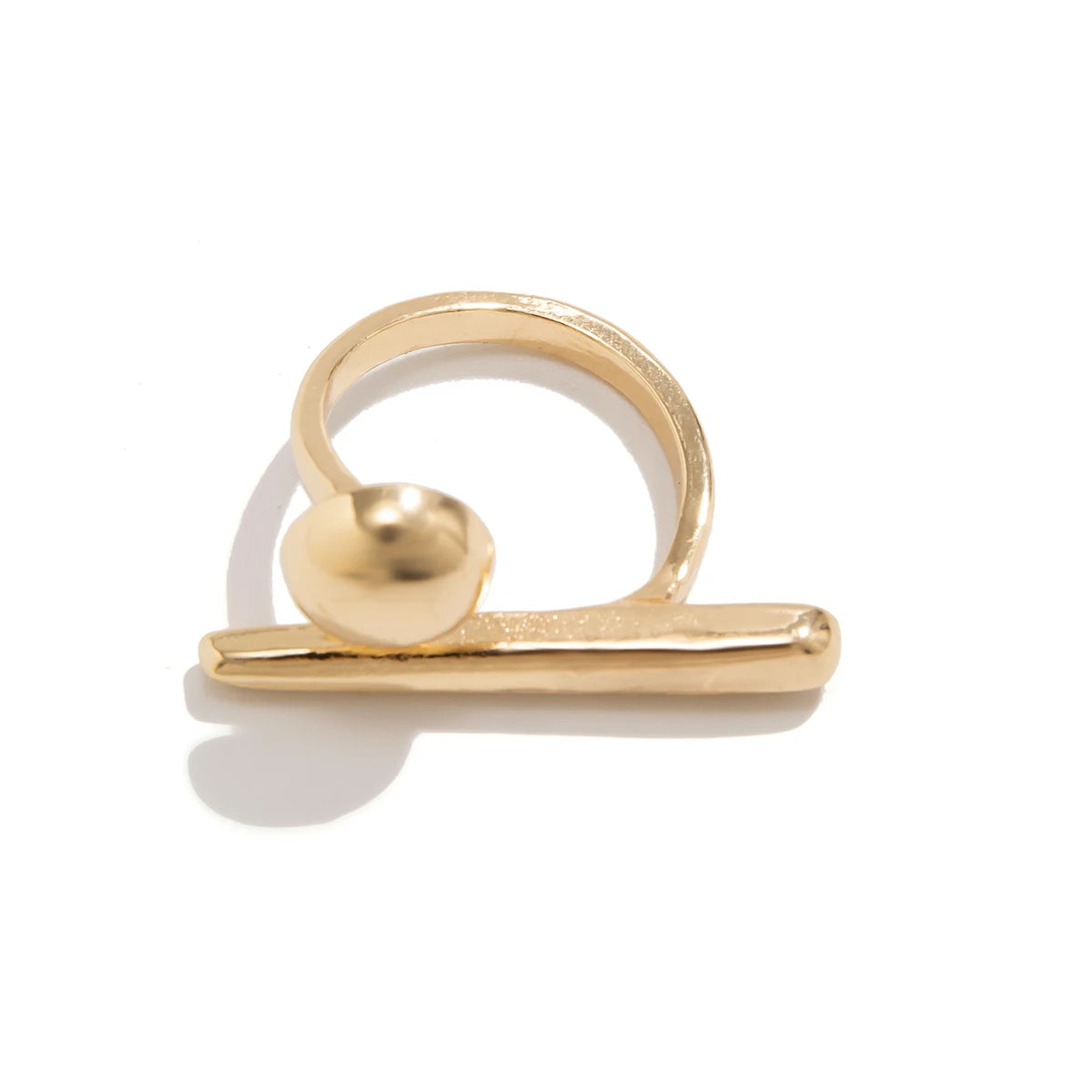 Gold-tone adjustable ring featuring a horizontal bar base with a spherical ball accent and open spiral band design.
