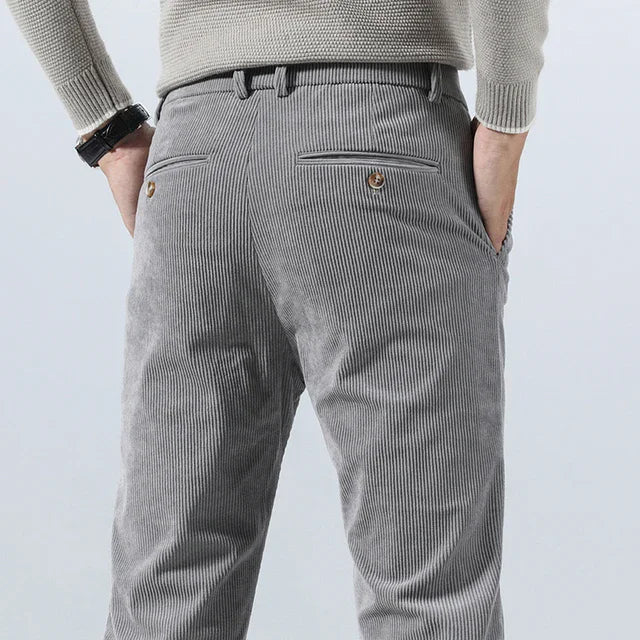 Men's gray corduroy slim fit dress pants with belt loops and back pockets, business casual style