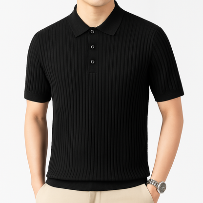 Black ribbed knit cotton men's polo shirt with short sleeves, spread collar, and three-button placket.