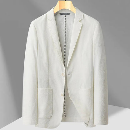 White textured two-button blazer for men with notch lapels and front pockets on wooden hanger