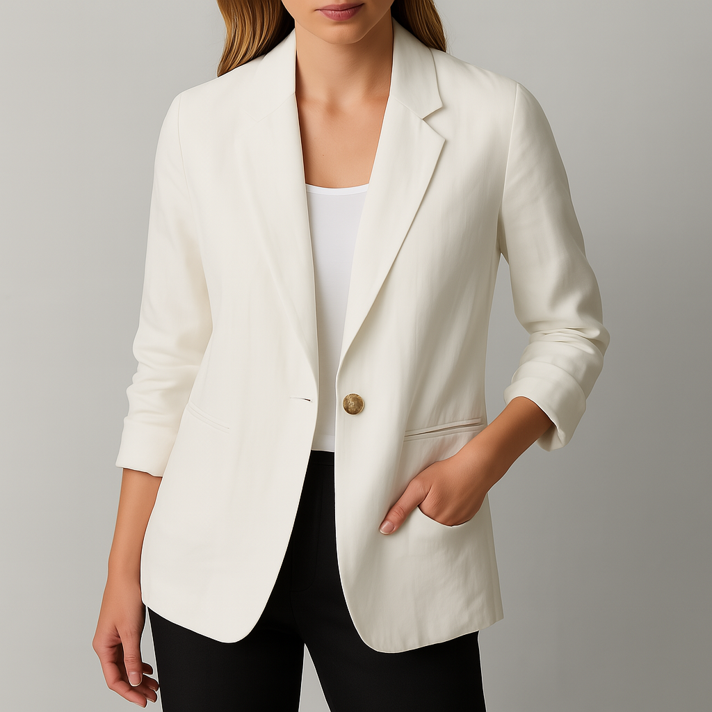 Women's white linen blazer jacket with notched lapels, single button closure, and pockets, worn with black pants