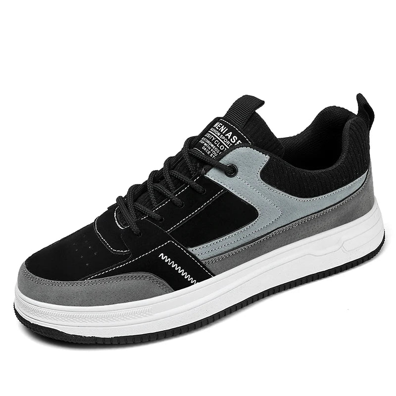 Men's black and gray patchwork low-top lace-up sneakers with white sole and text detail on tongue