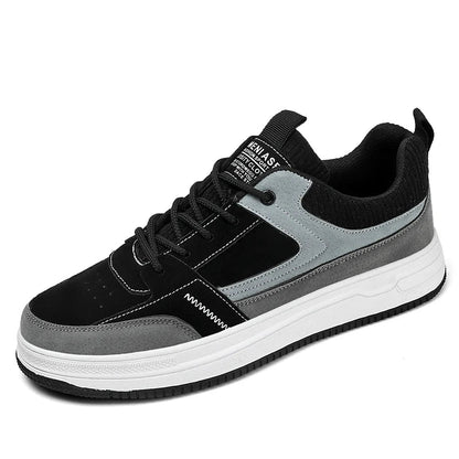 Men's black and gray patchwork low-top lace-up sneakers with white sole and text detail on tongue