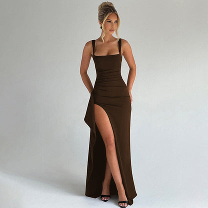 Brown square neck sleeveless maxi dress with high thigh slit and ruched waist detail, worn with black heeled sandals.