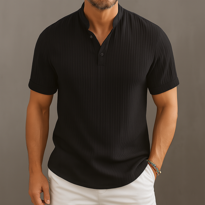 Black ribbed short sleeve popover shirt with band collar and buttons for men styled with white pants