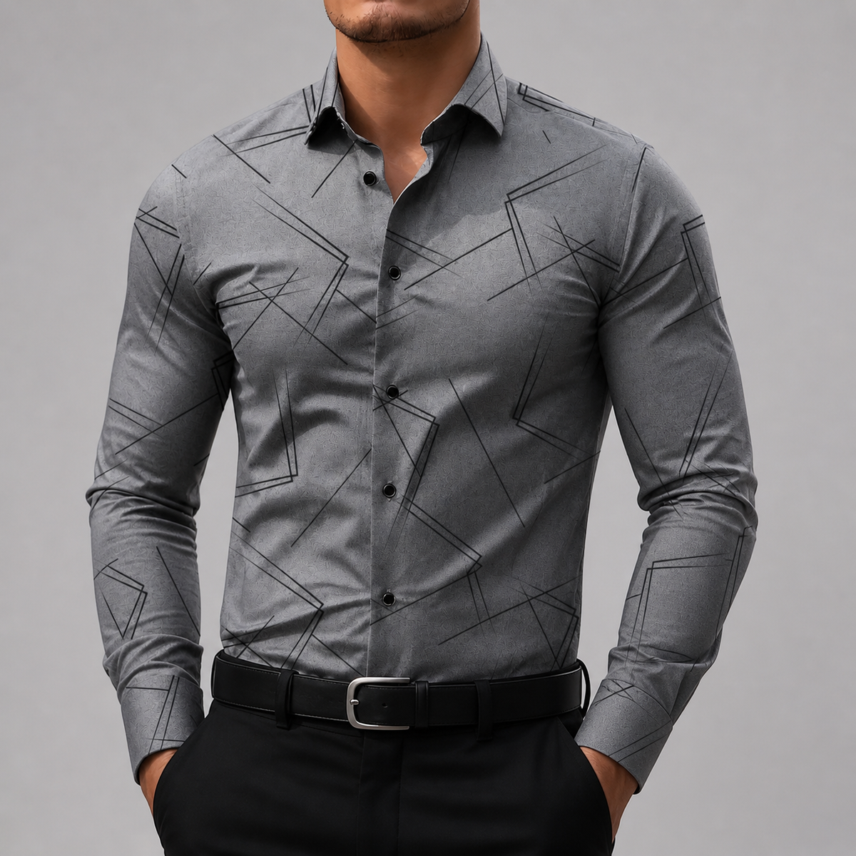 Men's slim-fit gray button-up shirt with black geometric line print, black buttons, worn with black trousers and belt.