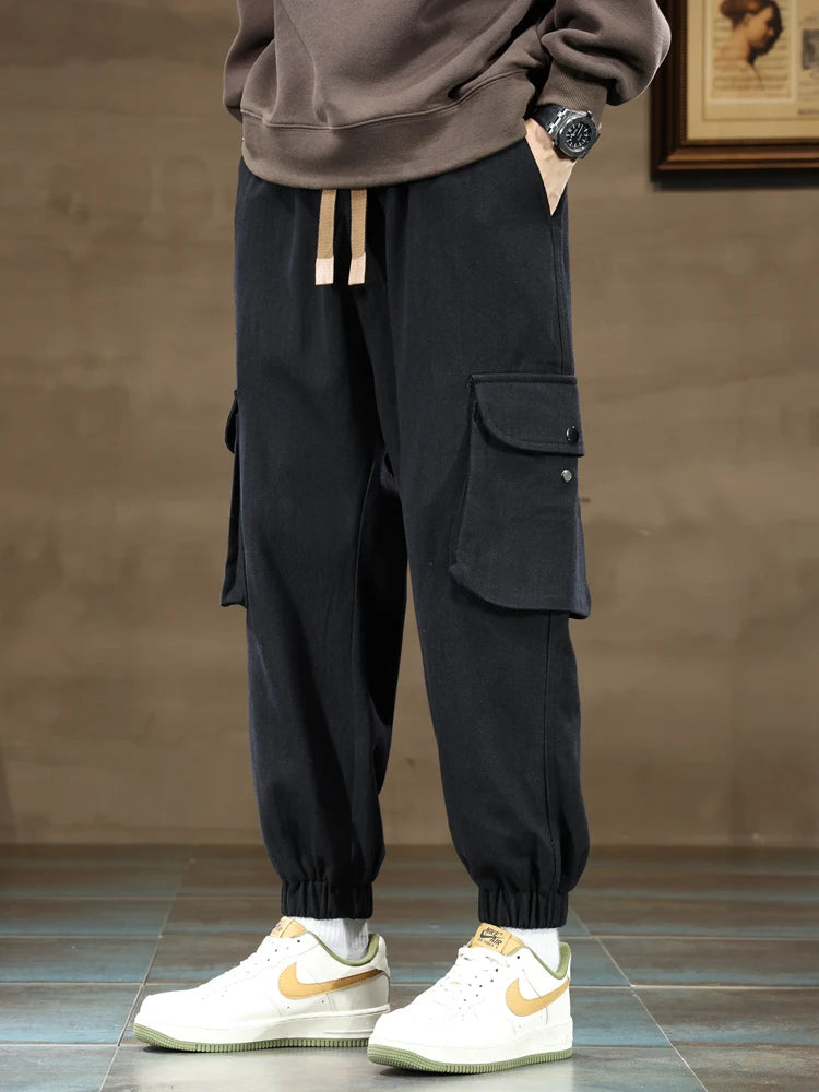 Black cargo joggers with elastic cuffs and utility pockets for men, tapered fit casual streetwear pants