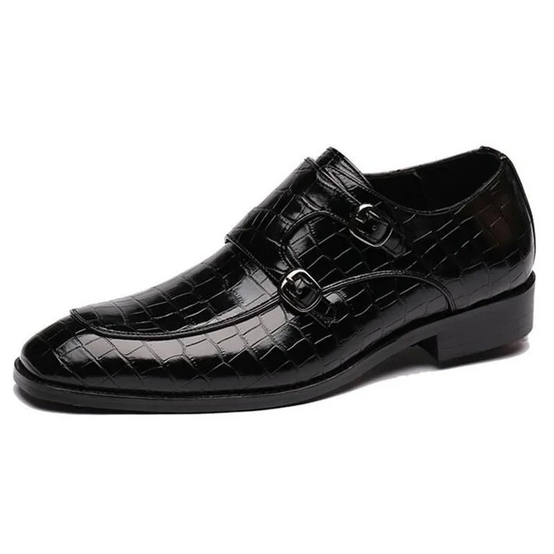 Black men's double monk strap dress shoes with crocodile embossed leather pattern and silver buckles
