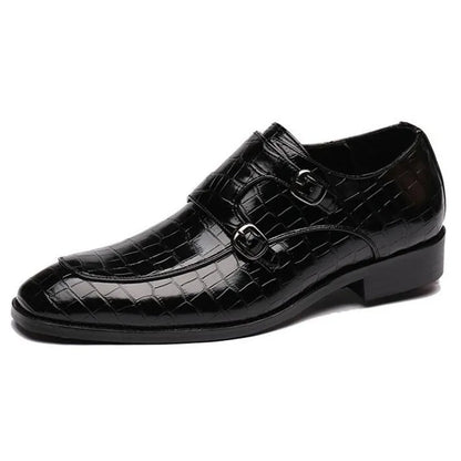 Black men's double monk strap dress shoes with crocodile embossed leather pattern and silver buckles
