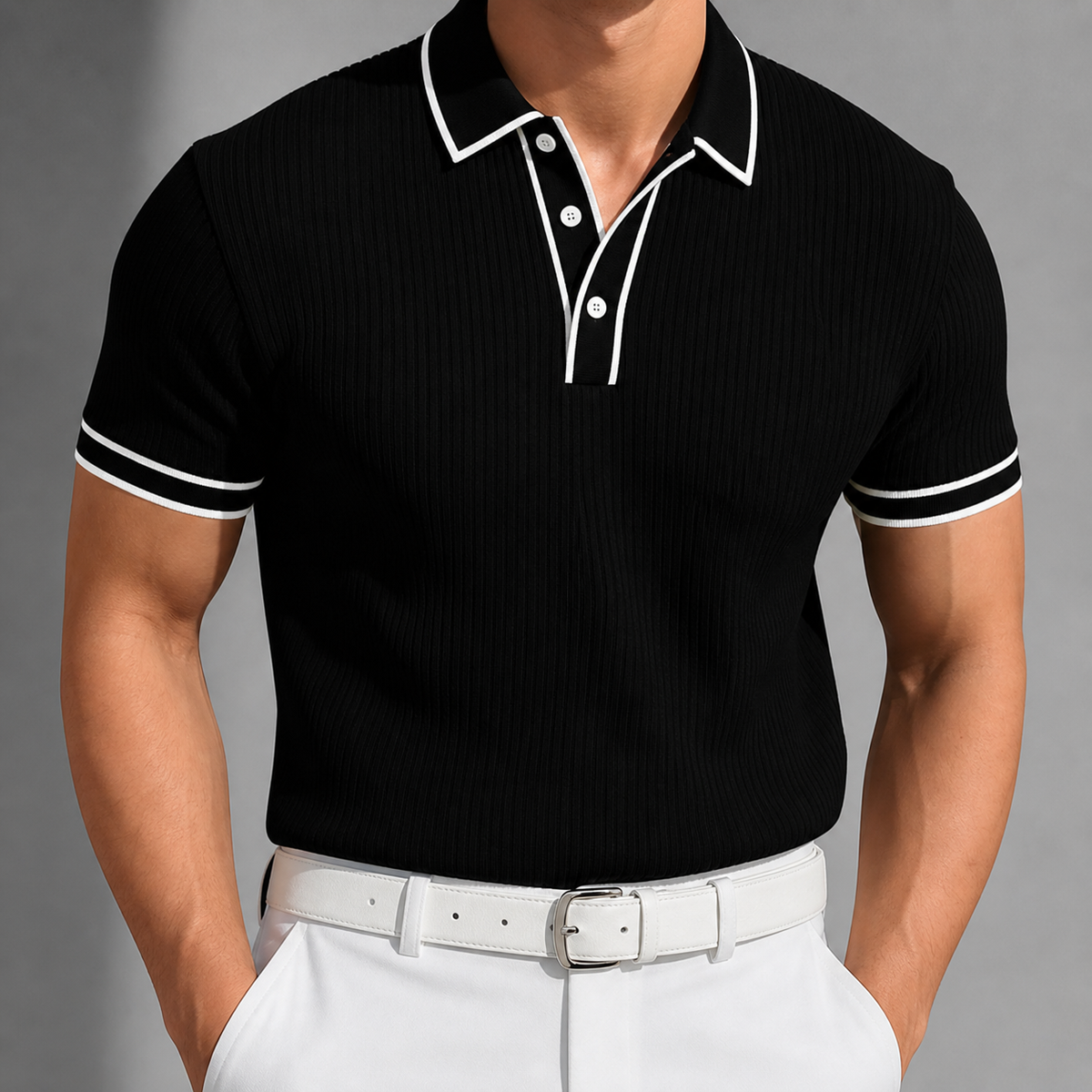 Men's black ribbed knit polo shirt with white contrast collar, button placket, and sleeve cuffs, paired with white pants.