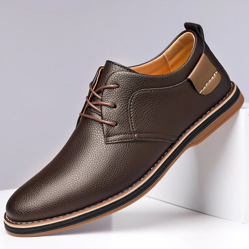 Men's brown leather derby dress shoes with lace-up closure and tan gum sole