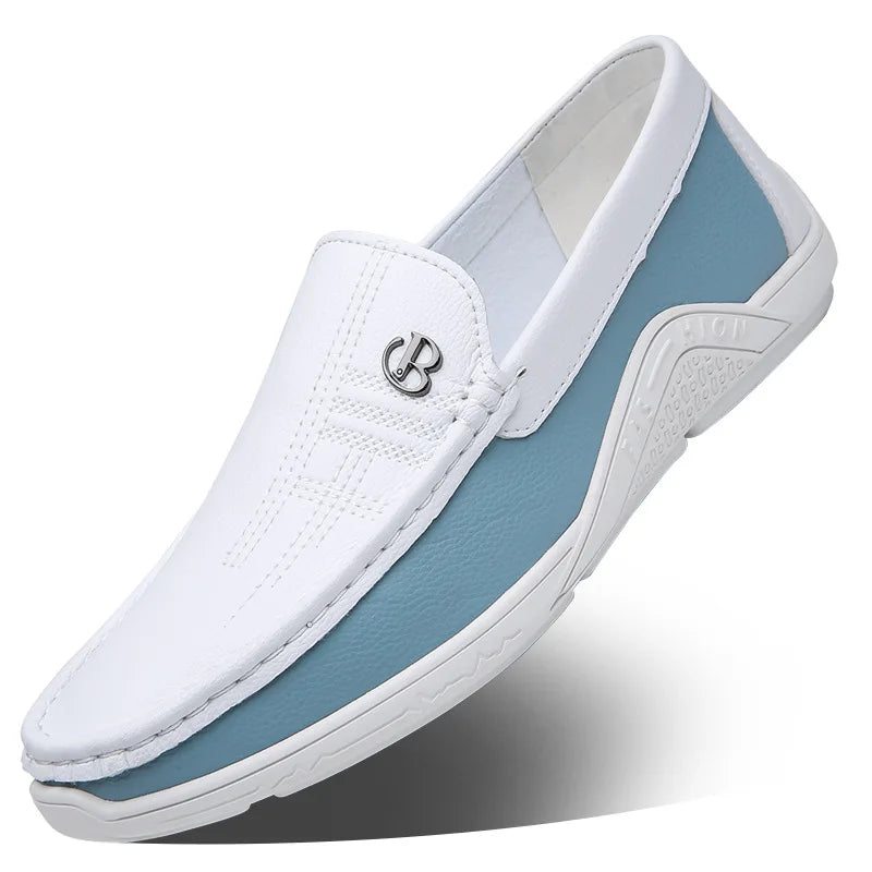 White and light blue men's leather slip-on loafers with metal CB logo detail and textured white sole