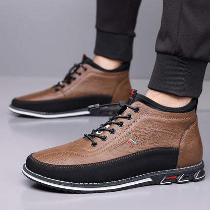 Brown leather mid-top men's sneakers with black lace-up closure, contrast stitching, and cushioned rubber sole