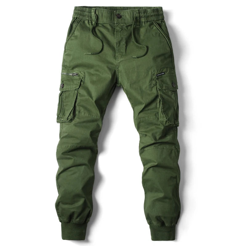 Army green slim-fit cargo jogger pants with elastic waistband, drawstring, multiple pockets, and ribbed ankles.