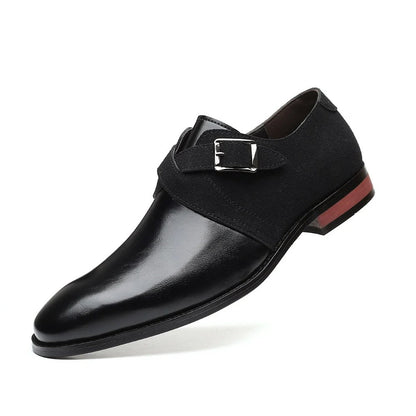 Black men's leather and suede monk strap loafer with silver buckle and red wooden heel on white background