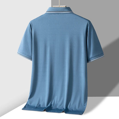 Men's blue short sleeve knit polo shirt with chest pocket and contrast trim on hanger