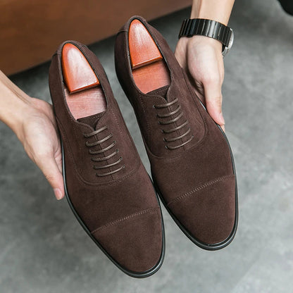 Brown suede lace-up dress shoes for men with cap toe detail and wooden shoe trees