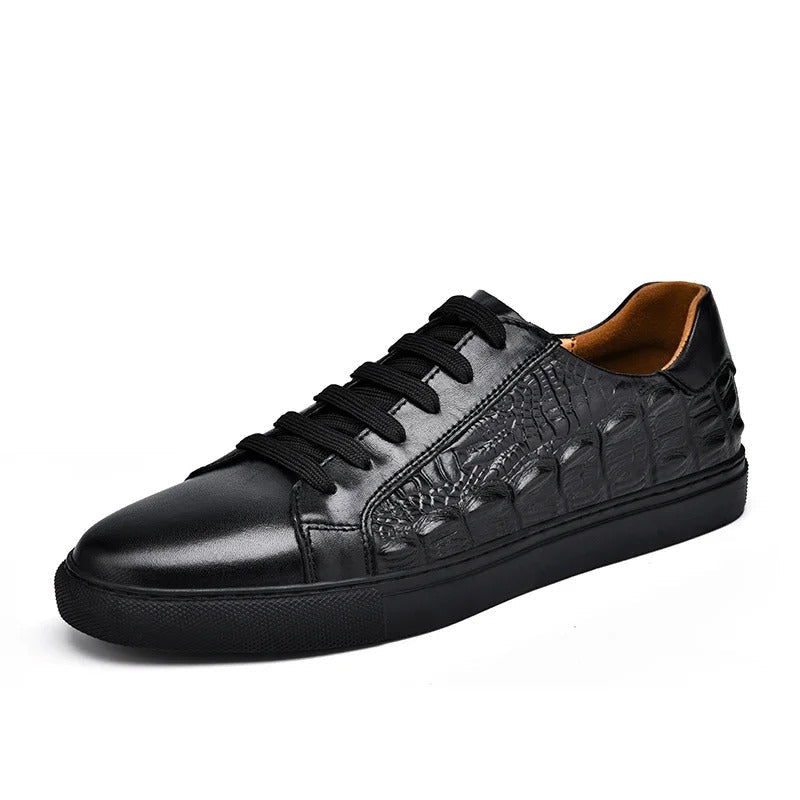 Black men's leather lace-up sneakers with crocodile embossed texture panel and tan interior lining
