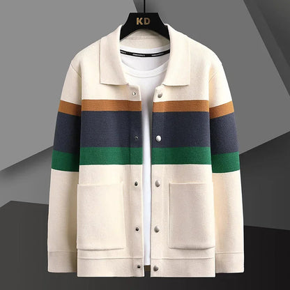 Men's cream striped wool blend cardigan with brown, navy, green stripes, magnetic buttons, and front pockets on hanger