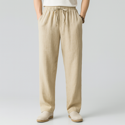 Men's beige linen drawstring pants with elastic waistband and relaxed straight leg fit