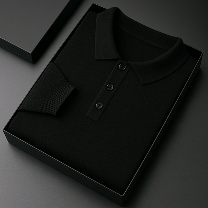 Black merino wool long sleeve men's polo sweater with three buttons and ribbed cuffs, neatly folded in a black gift box.