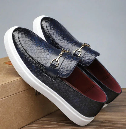 Navy blue embossed leather slip-on loafers with gold horsebit buckle and white platform sole for men
