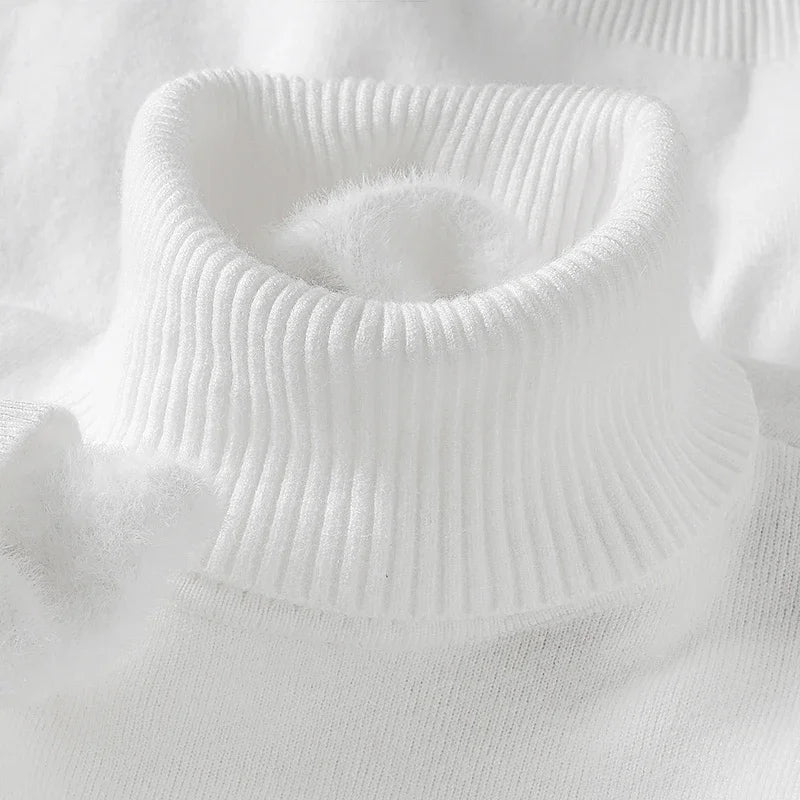 White men's merino wool turtleneck sweater with ribbed collar detail, close-up view showing soft knit texture