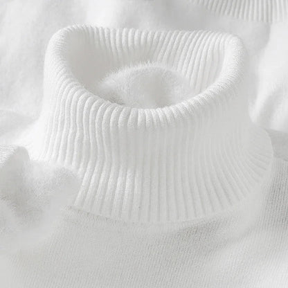 White men's merino wool turtleneck sweater with ribbed collar detail, close-up view showing soft knit texture