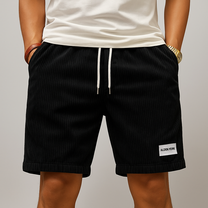 Black corduroy drawstring shorts for men with Alden York label and elastic waistband