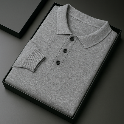 Grey merino wool long sleeve men's polo sweater with buttons, neatly folded in a black gift box.