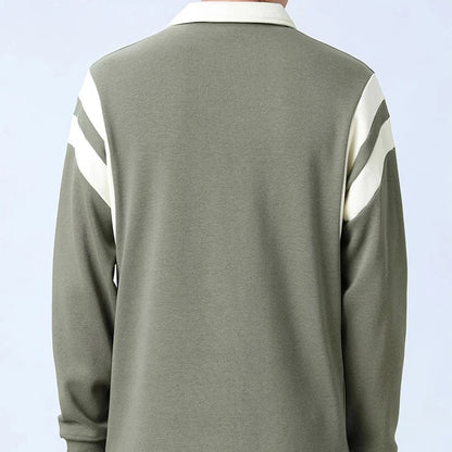 Back view of men's sage green quarter-zip cotton blend sweater with cream diagonal shoulder stripes and collar.