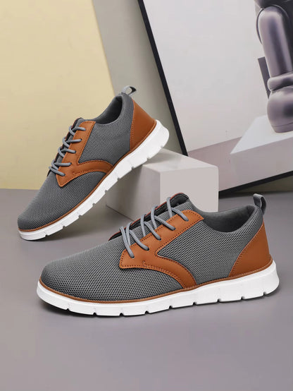 Gray and brown mesh canvas leather orthopedic sneakers with lace-up closure and white sole for women.