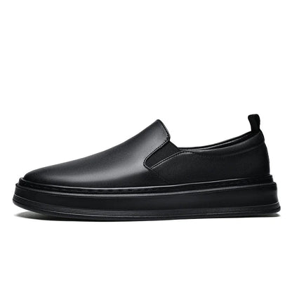 Black leather slip-on loafer sneakers for men with elastic side panels and thick flat sole, side view