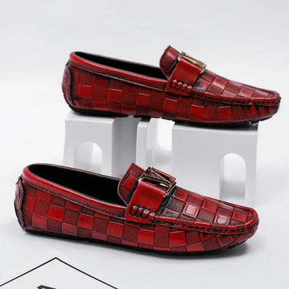 Red checkered slip-on loafers for men with gold metal buckle detail and textured leather upper