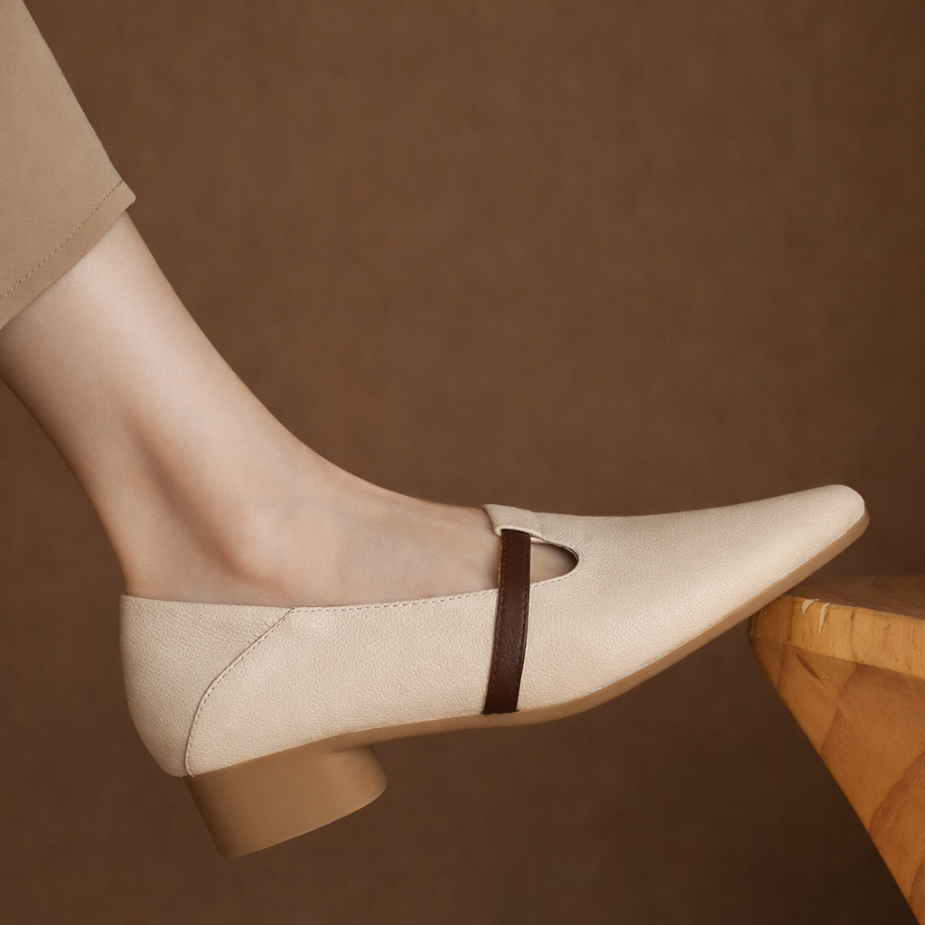 Beige pointed-toe T-strap flats with brown leather strap and low block heel for women