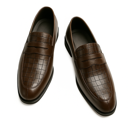 Brown croc-embossed leather penny loafers for men with slip-on design and black sole, shown as a pair.