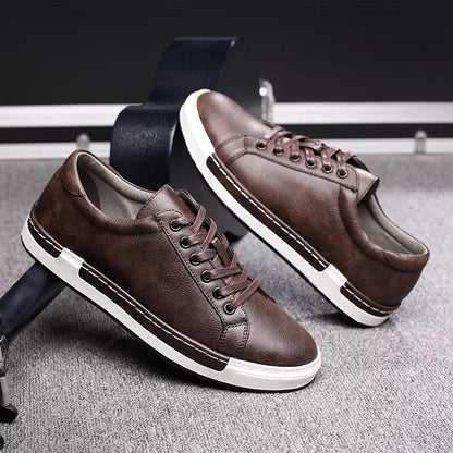 Brown leather lace-up sneakers for men with white sole and contrast stitching detail low-top casual shoes