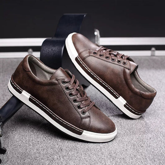 Brown leather lace-up sneakers for men with white sole and contrast stitching detail low-top casual shoes