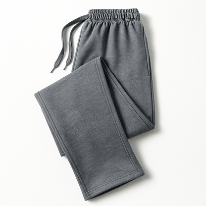 Gray men's cotton drawstring joggers with elastic waistband, folded flat on white background.