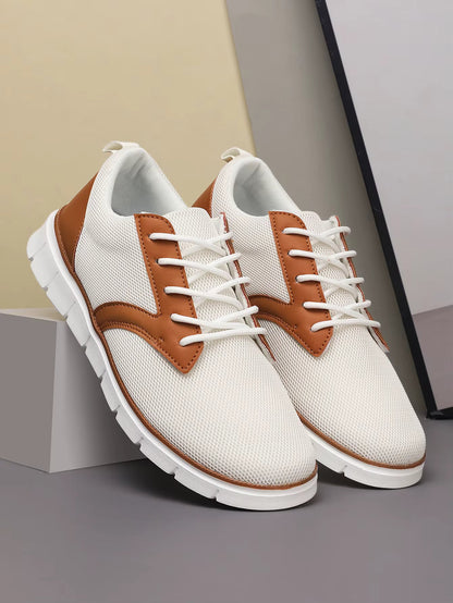 White canvas orthopedic sneakers with brown leather accents and white laces for women comfortable walking shoes