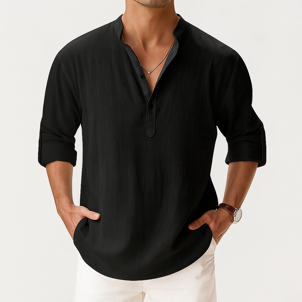 Black linen henley shirt for men with rolled sleeves and collar, paired with white pants