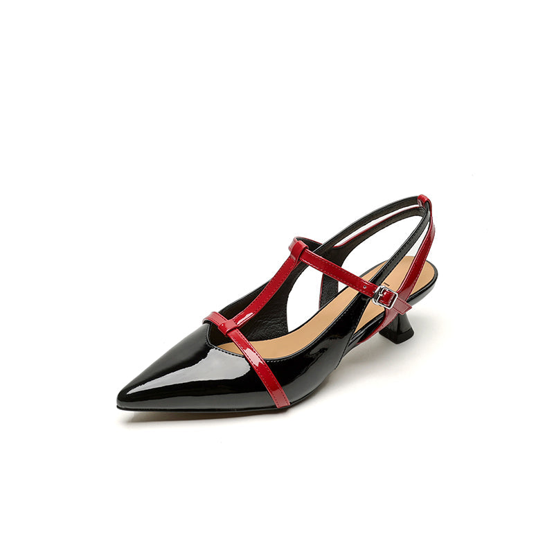 Black patent leather pointed-toe kitten heel slingback sandals with red T-strap and silver buckle detail